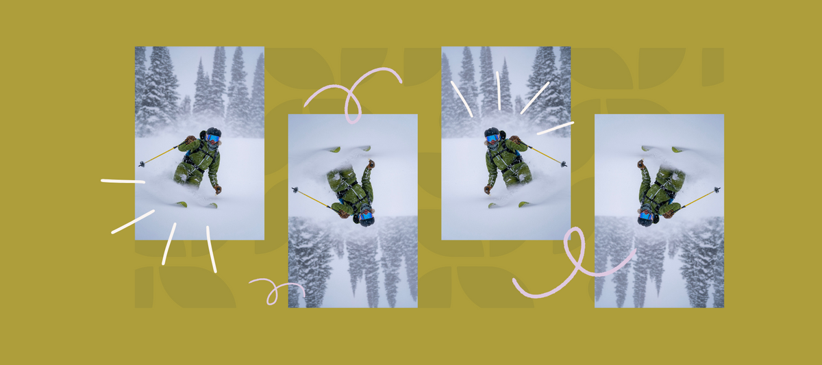 A skier in a snowy landscape, skiing through powder with trees in the background.