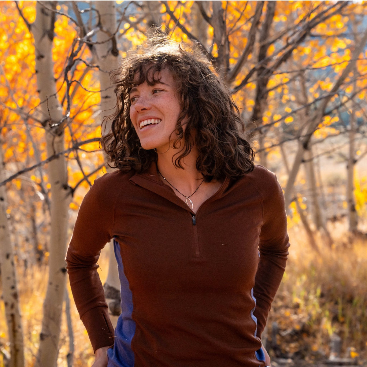 [Chestnut Storm] Woman standing in a forest with autumn foliage