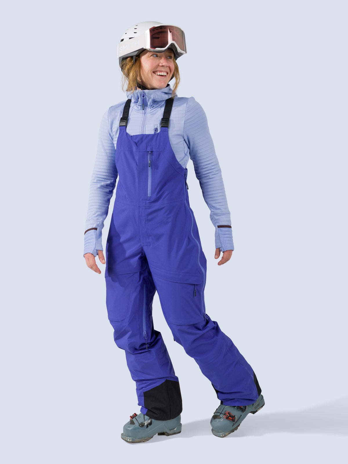 [Lapis] Heyburn 3L Bib in lapis blue, on model side full body view
