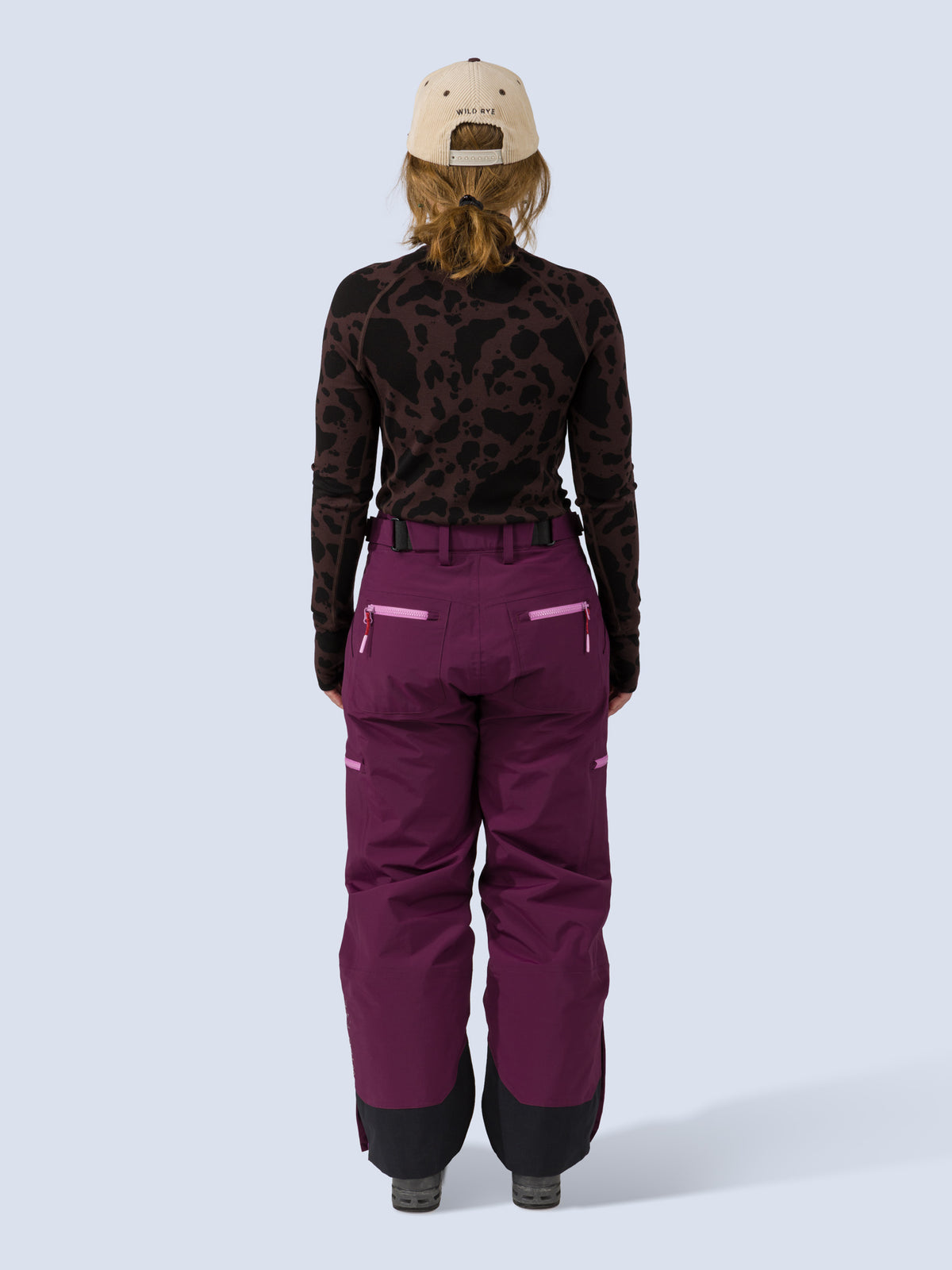 [Mulberry] Roundhouse 2L Insulated Pant in mulberry purple, on model back full body view