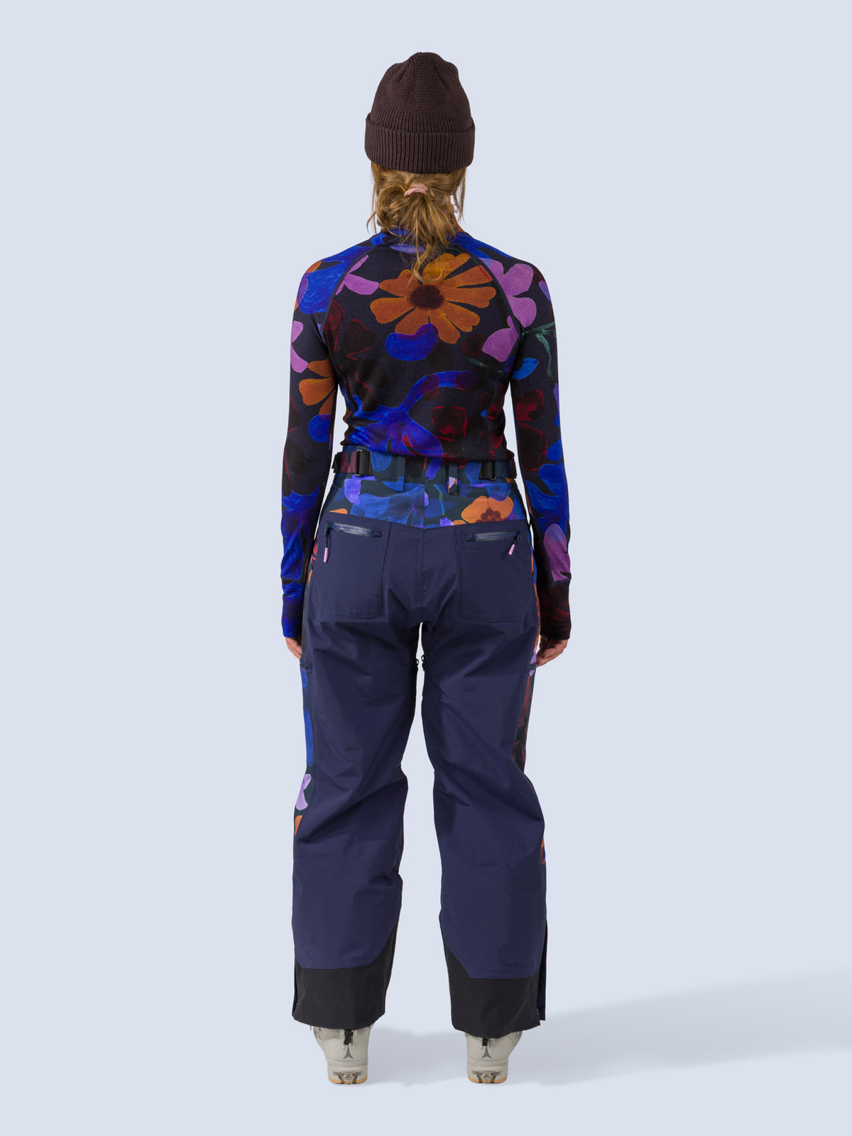 [Nightflora] Roundhouse 2L Insulated Pant in navy with nightflora floral print panels, on model back full body view