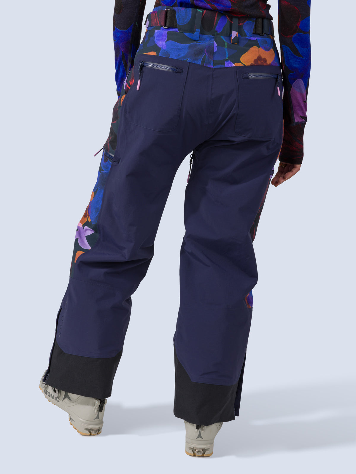 [Nightflora] Roundhouse 2L Insulated Pant in navy with nightflora floral print panels, on model back crop view