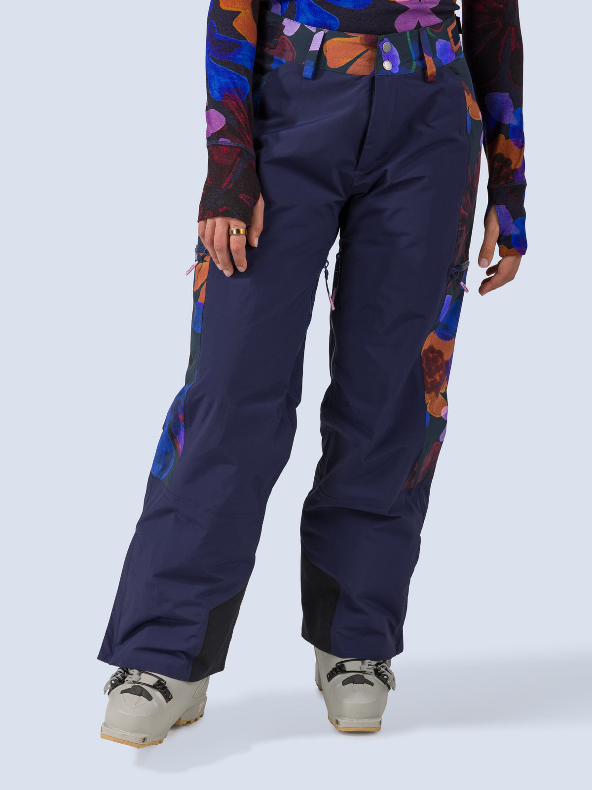 [Nightflora] Roundhouse 2L Insulated Pant in navy with nightflora floral print panels, on model front crop view