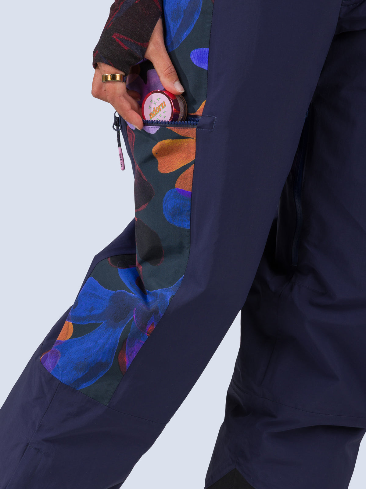 [Nightflora] Roundhouse 2L Insulated Pant in navy with nightflora floral print panels, thigh pocket detail