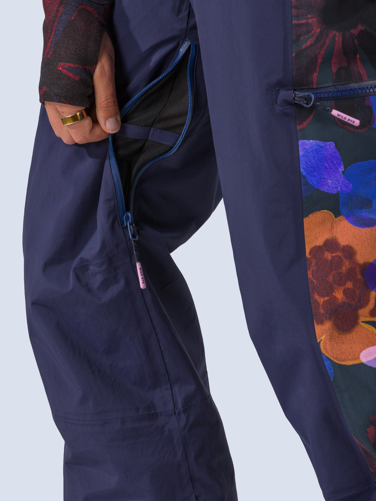 [Nightflora] Roundhouse 2L Insulated Pant in navy with nightflora floral print panels, inner thigh vent detail