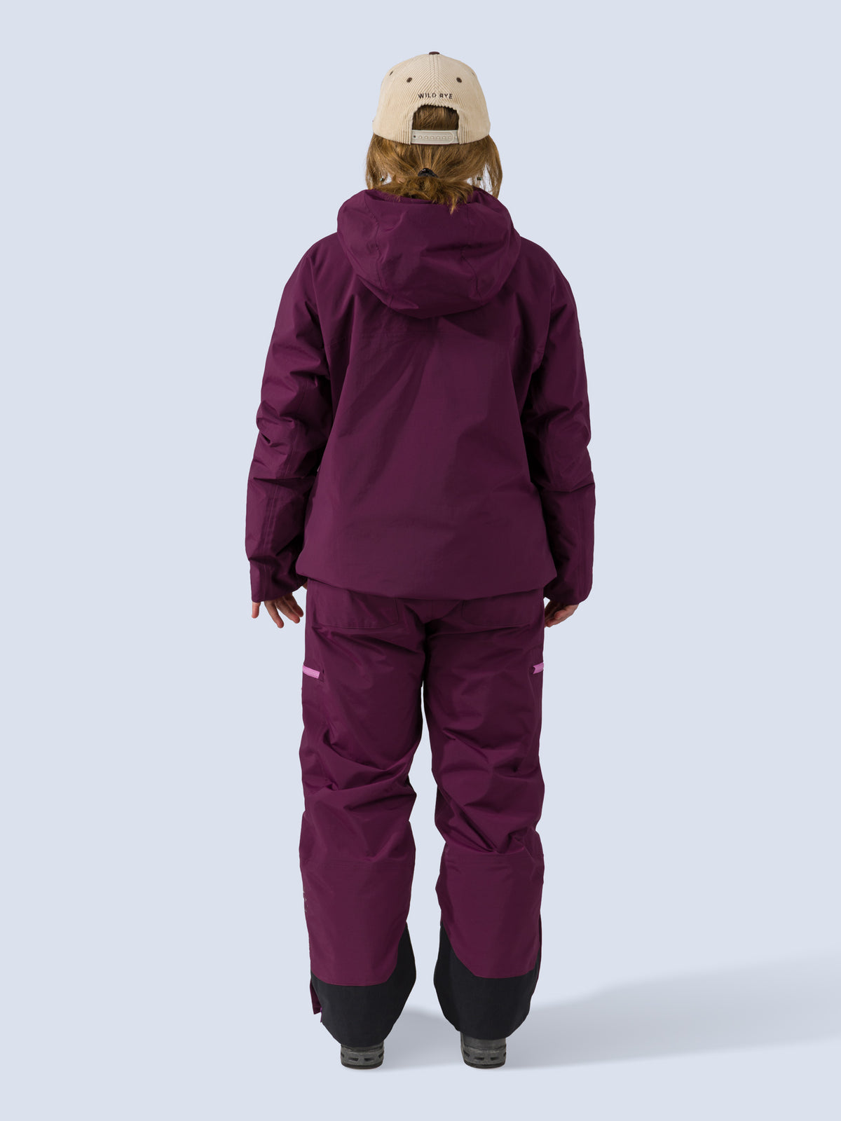 [Mulberry] Roundhouse 2L Insulated Pant in mulberry purple, on model back full body view with matching jacket