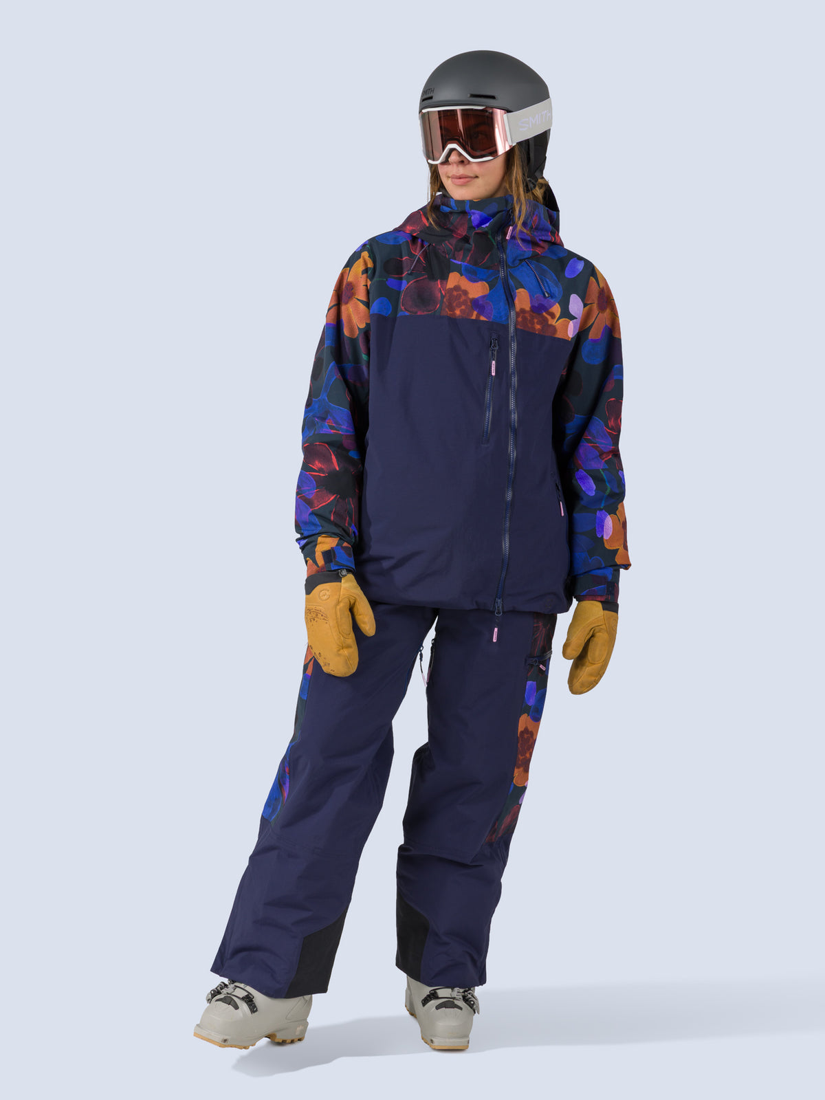 [Nightflora] Roundhouse 2L Insulated Pant in navy with nightflora floral print panels, on model front full body view with matching jacket