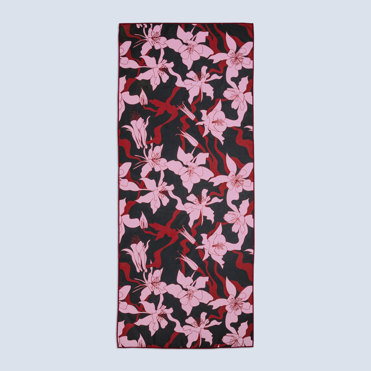 Quick drying towel with pink floral pattern on a black base fabric