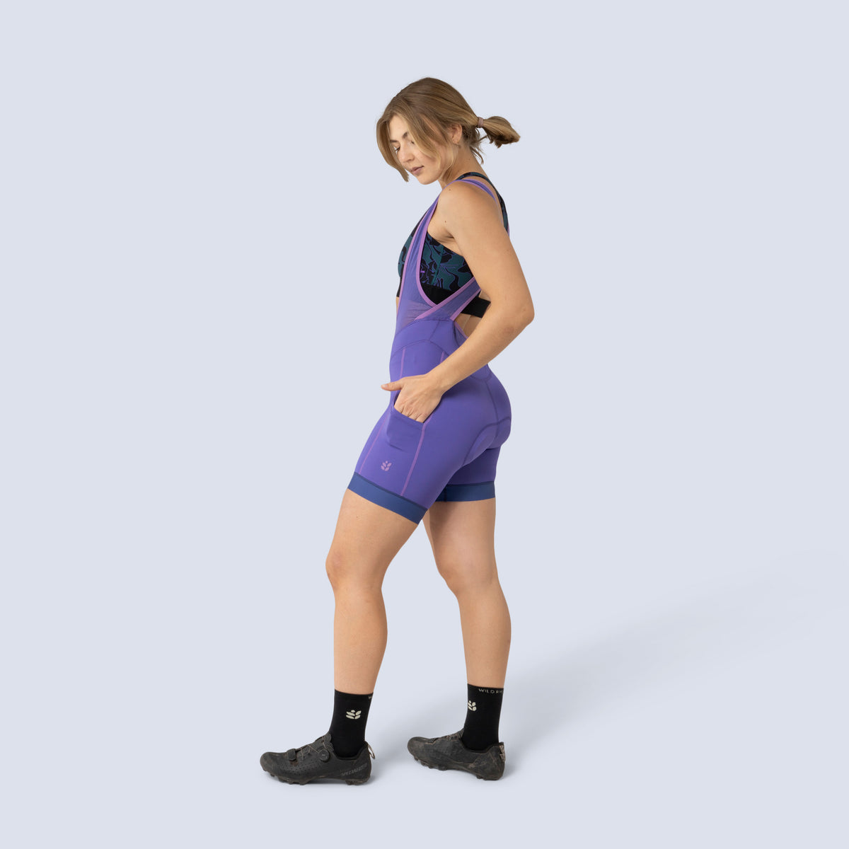 [Iris] Billie Stash Bib in Iris, on model front full body view
