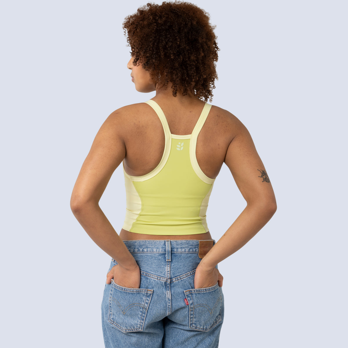 [Gecko Blocked] Lucille crop tank in yellow color block, on model back crop view