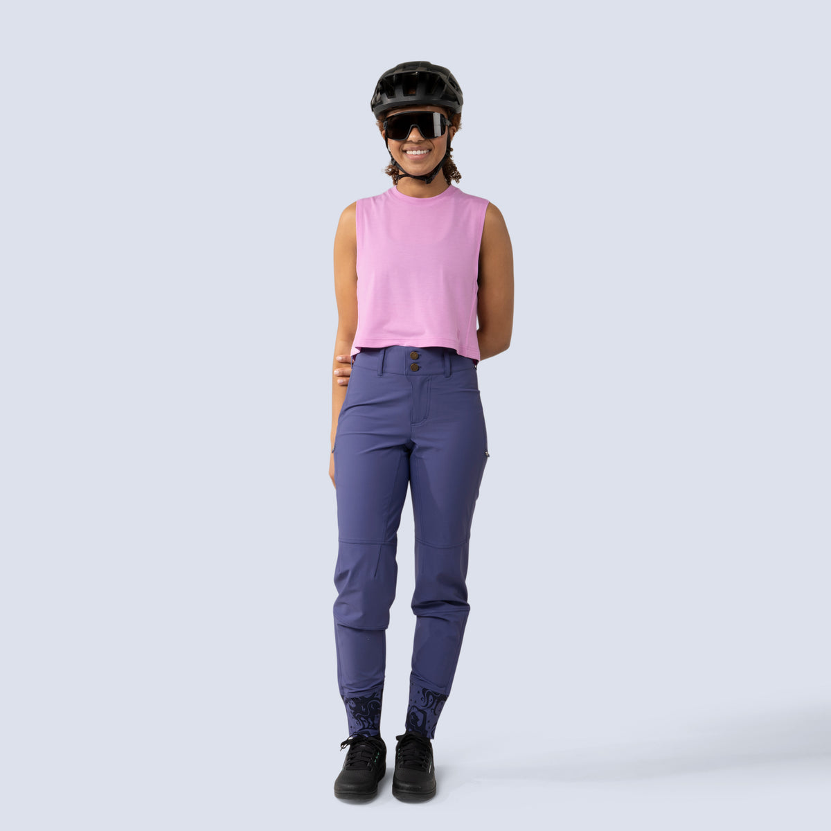 [Reflections] Person wearing a pink sleeveless top and purple freyah pants