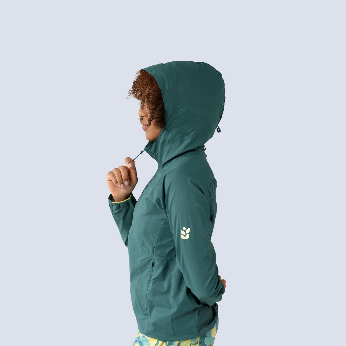 [Shaded Spruce] Rustler windbreaker in shaded spruce, side profile view of hood up