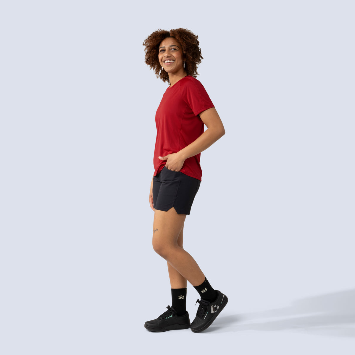[Black] Freda 7" Bike Short in black, on model side full body view