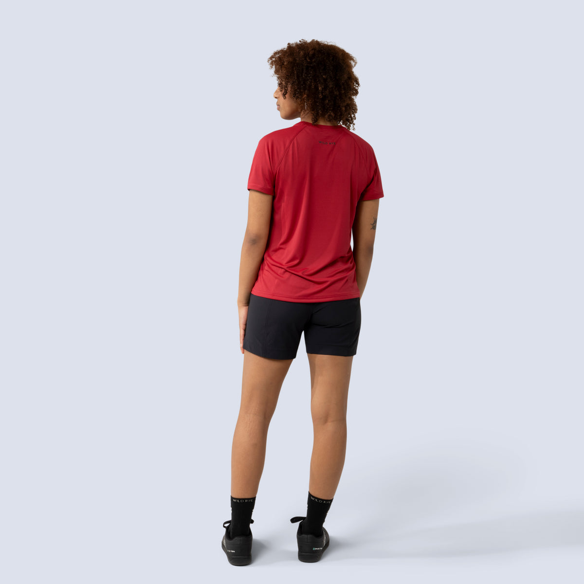 [Black] Freda 7" Bike Short in black, on model back full body view