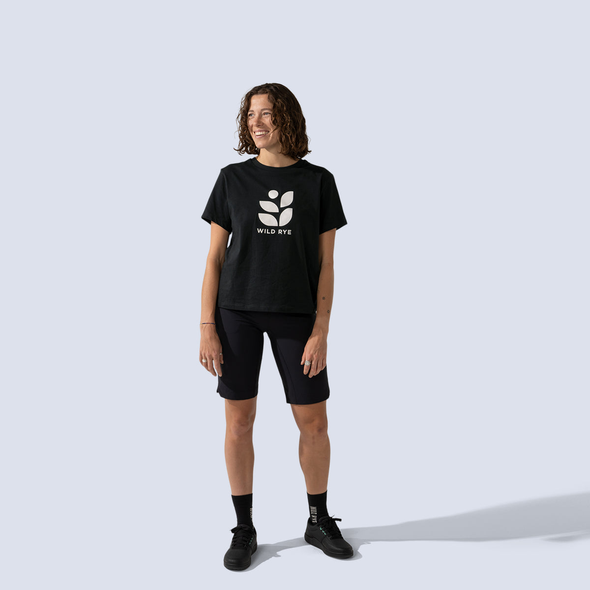 [Black] Freel 12" bike shorts in black, on model front full body view