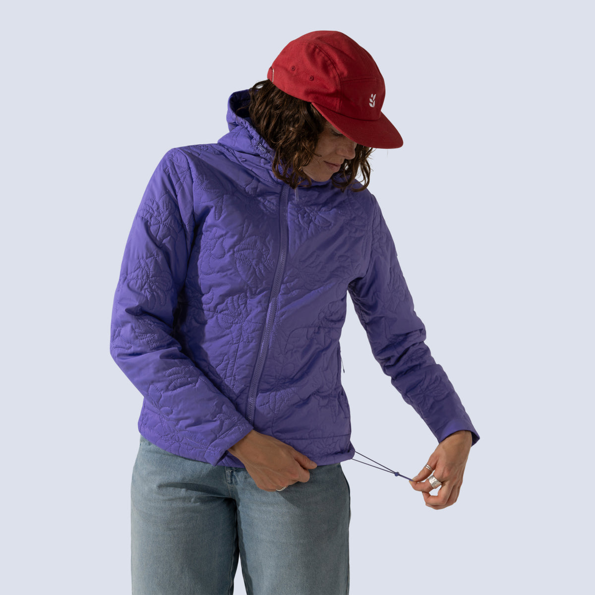 [Iris] Payette insulated jacket in iris purple, on model hem cinch detail