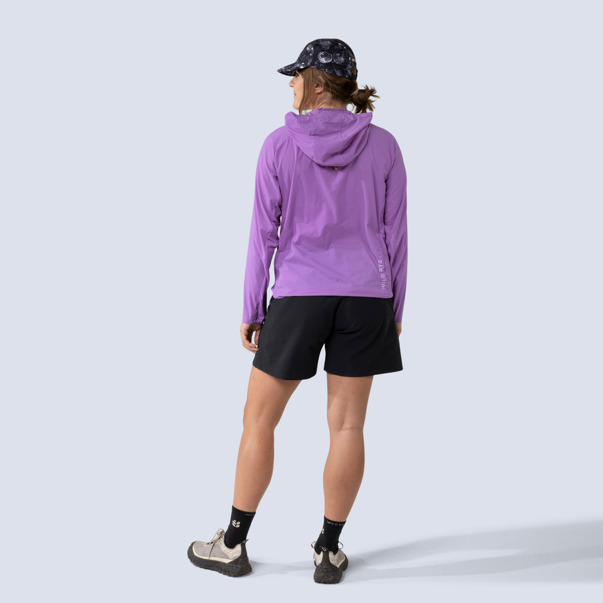 [Black] Esther Short in black, on model back full body view with rustler jacket