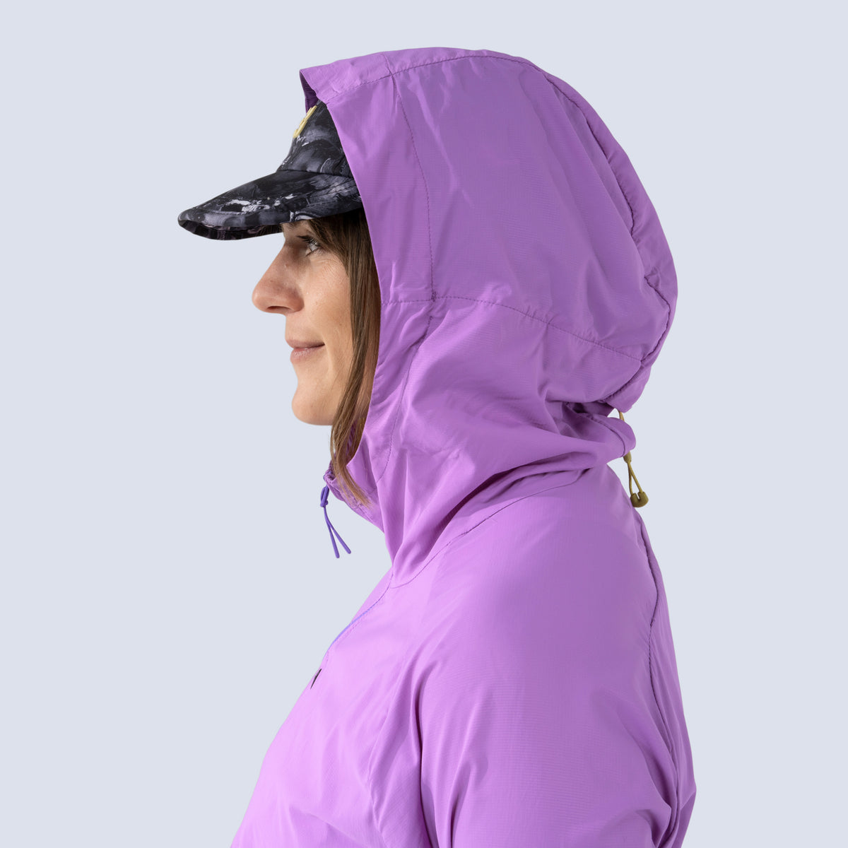 [Amethyst] Rustler windbreaker in amethyst, on model side hood profile view