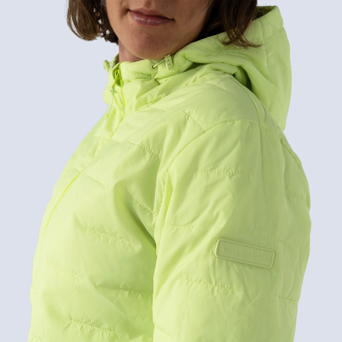 [Iced Matcha] Payette insulated jacket in matcha green, "Wild Rye" silicone patch detail on arm